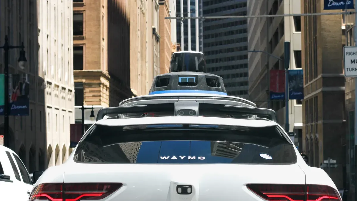 Featured image for Waymo shipped a flood fix. Then a robotaxi drove into a flood.